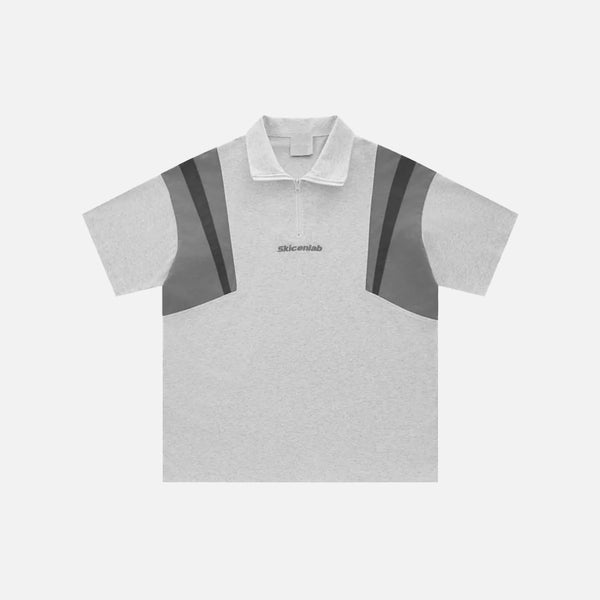 Front view of the gray Retro Zip-up Polo Patchwork T-shirt in a gray background from DAXUEN