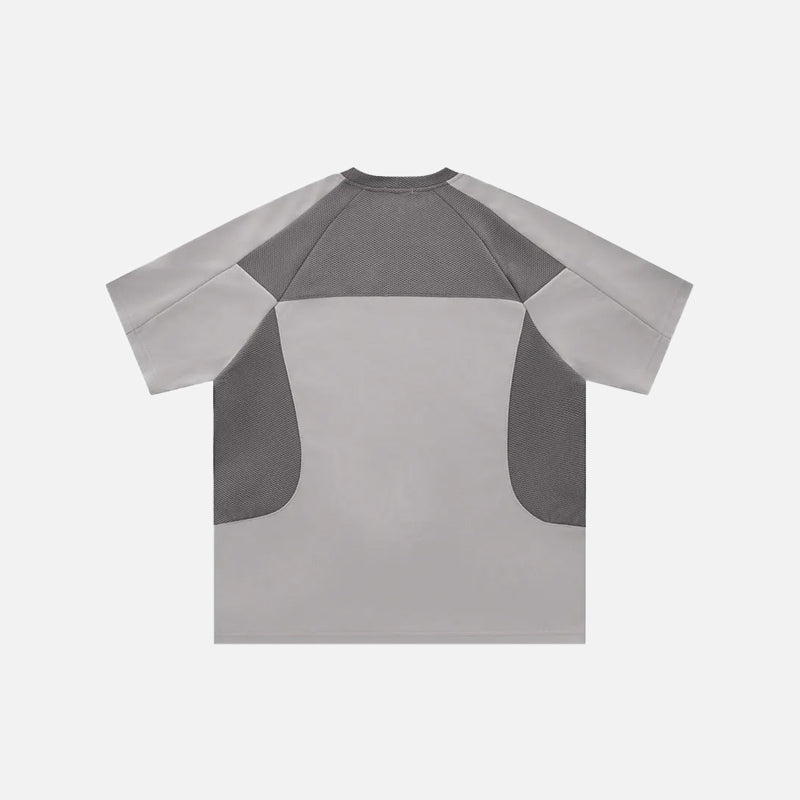 Back view of the gray Retro Racing Patchwork T-shirt in a gray background from DAXUEN.