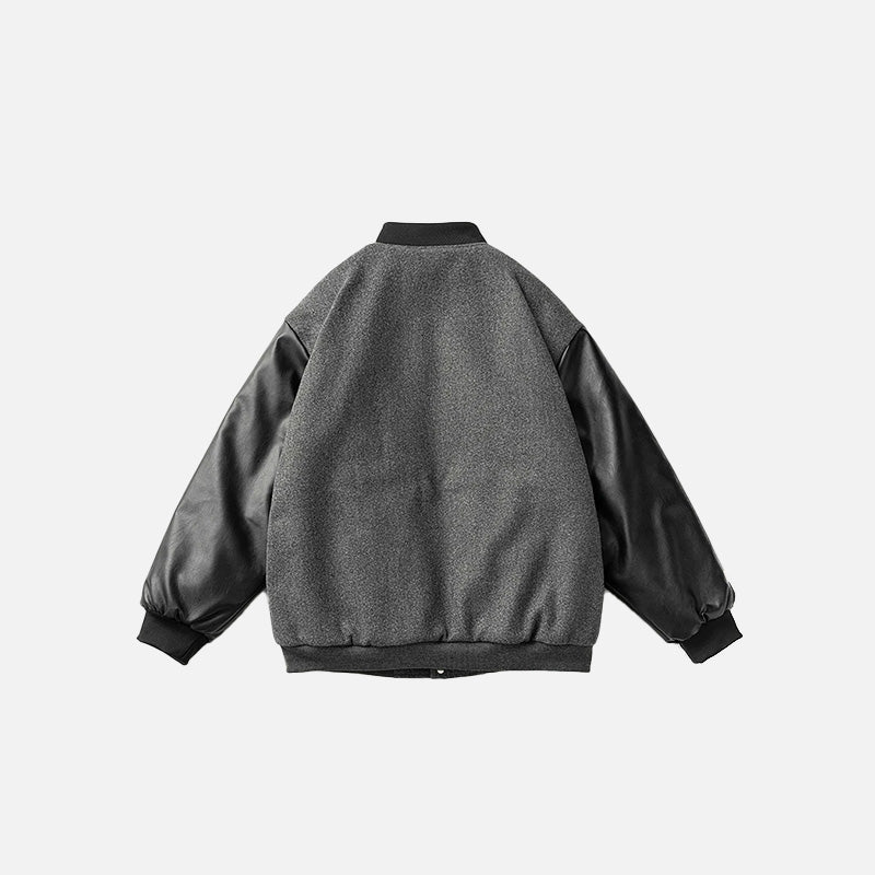 Back view of the dark grey Neoism Varsity Jacket in a gray background