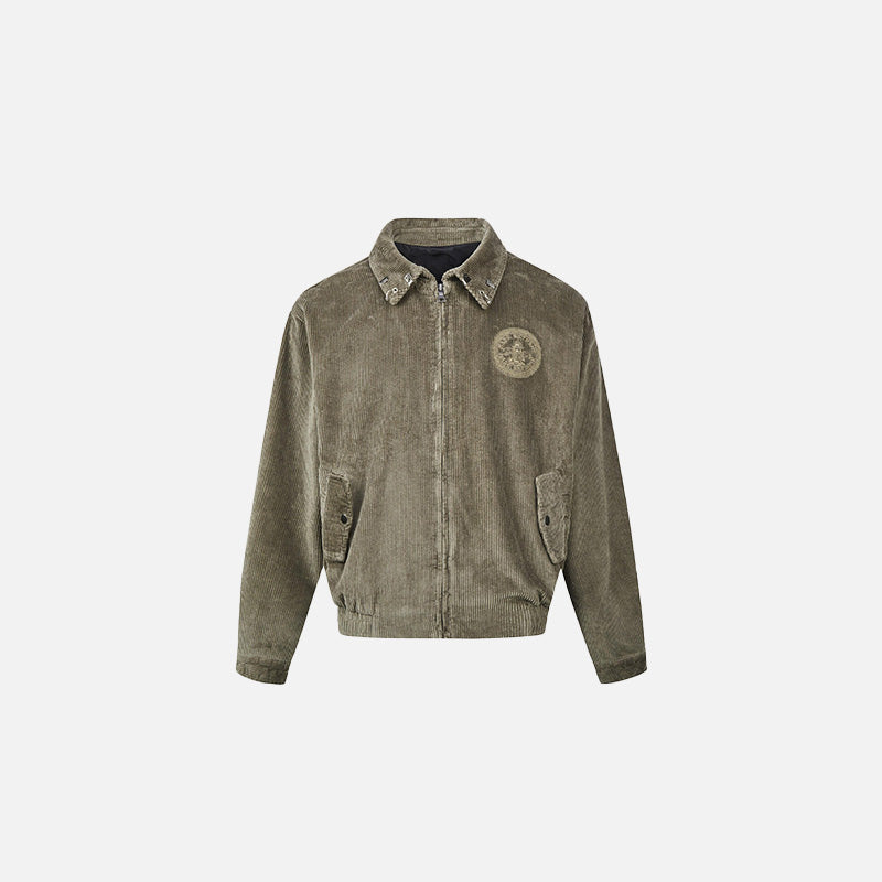 Front view of the apricot Slate Crest Jacket in a gray background