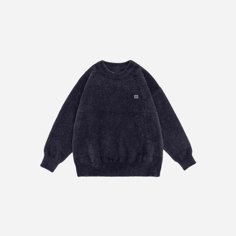 Front view of the navy blue Classic Cozy Knit Sweatshirt in a gray background