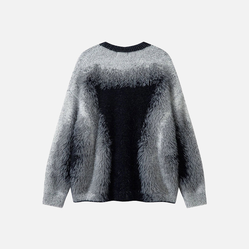 Back view of the black Textured Knit Oversized Sweater in a gray background