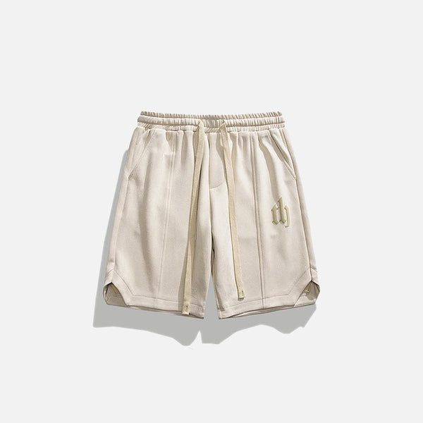 Front view of the beige Vintage Cozy Sports Shorts in a gray background