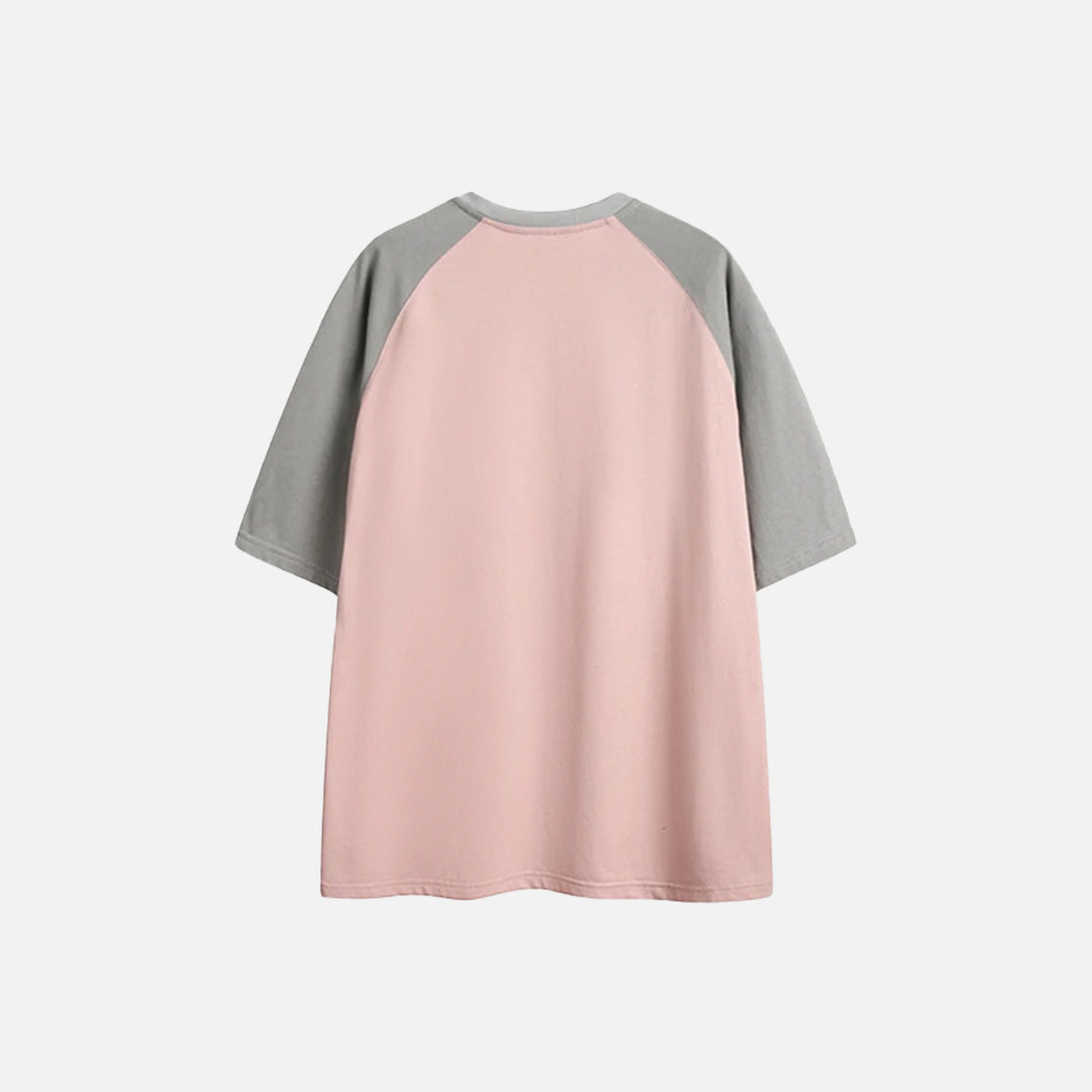 Back view of the pink Classic Raglan T-shirt in a gray background