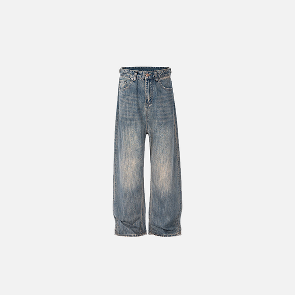 Front view of the blue Vintage Wide-Leg Distressed Jeans in a gray background