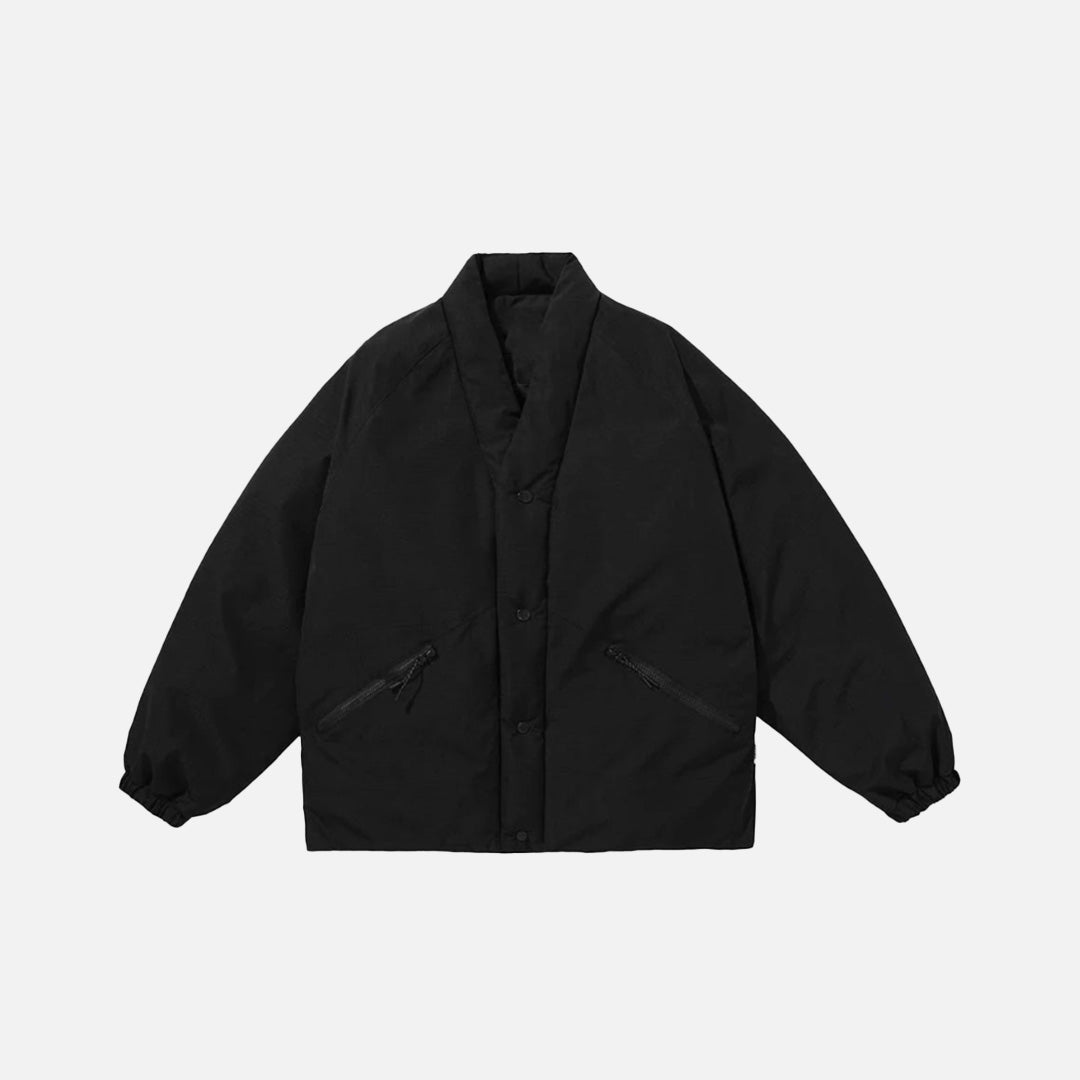 Front view of the black Minimalost Boxy Jacket in a gray background