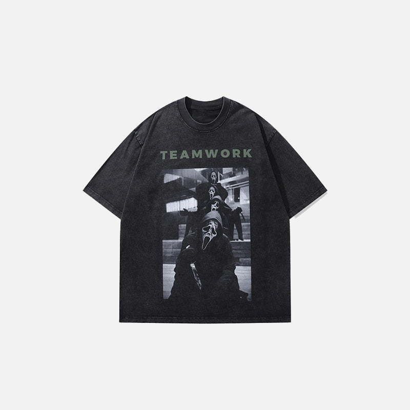 Front view of the black Ghostly Teamwork T-shirt in a gray background