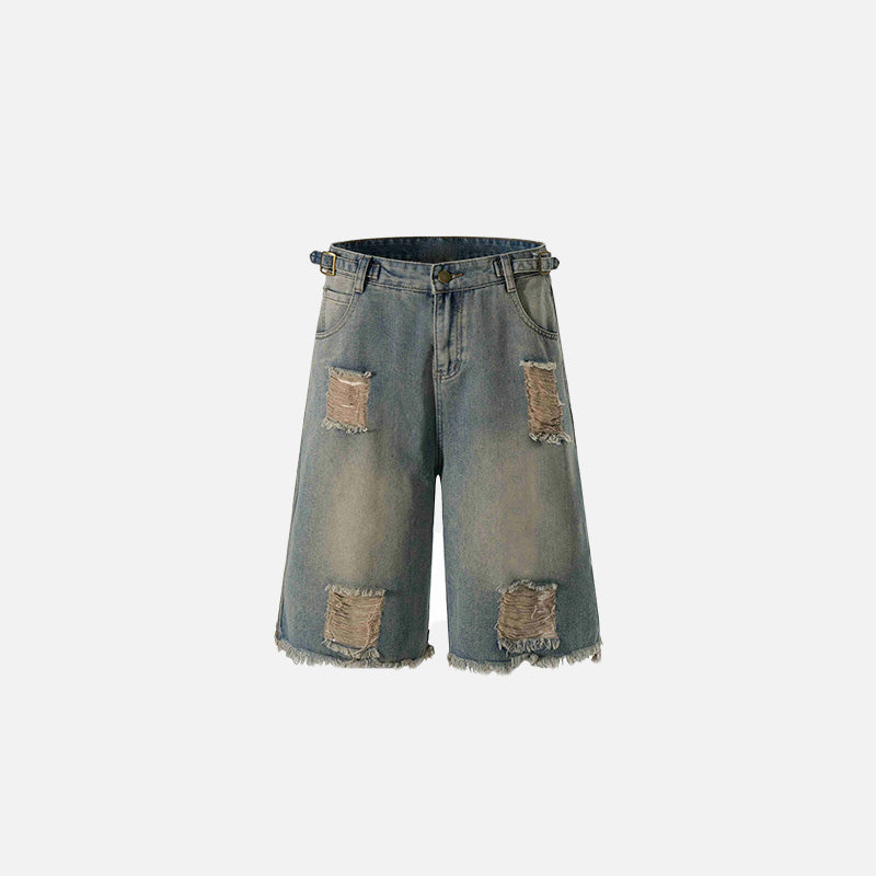 Front view of the blue Washed Distressed Jorts in a gray background 