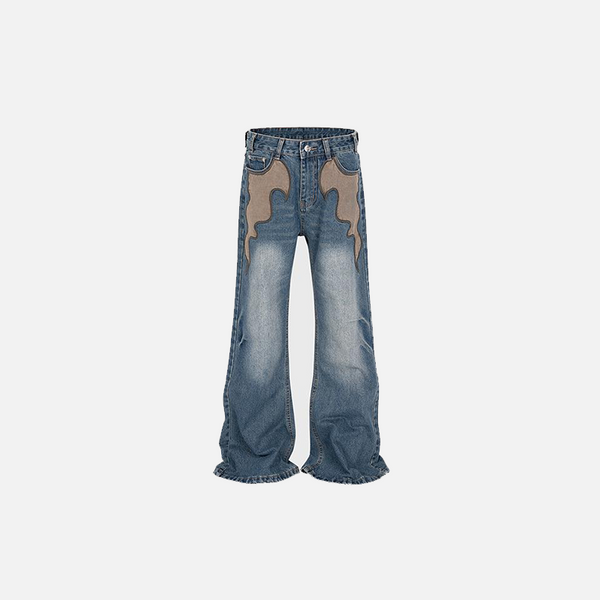 Front view of the blue Retro Flare Jeans in a gray background