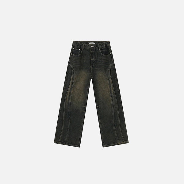 Front view of the green Flowline Denim Jeans in a gray background