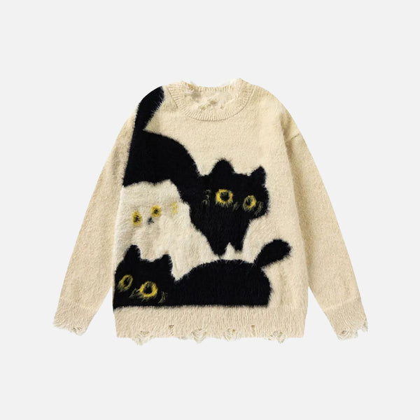 Front view of the beige Black Cat Sweater in a gray background