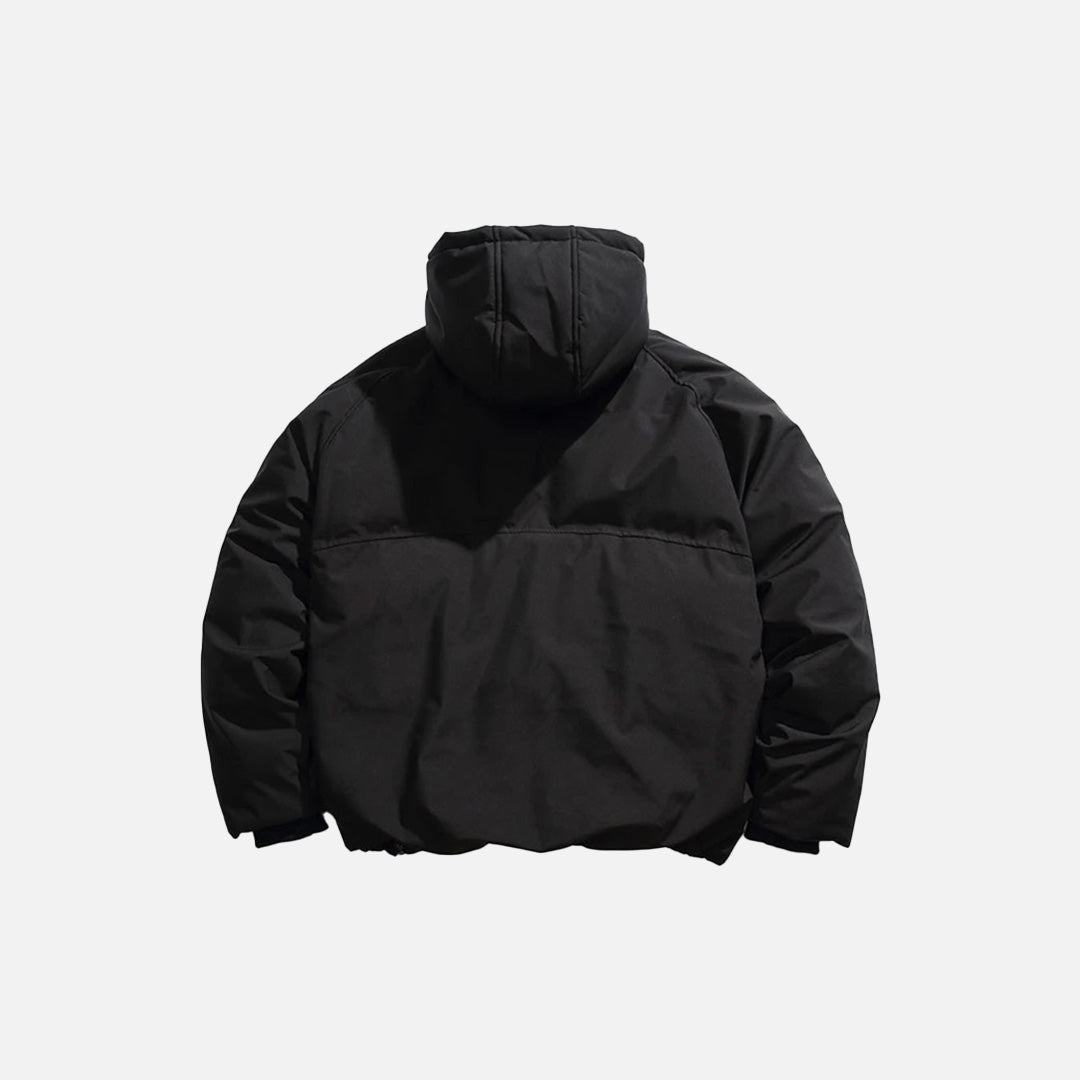 Back view of the black Cross-Zip Quilted Jacket in a gray background