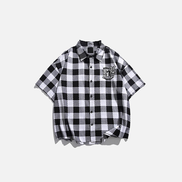 Front view of the black Chess Plaid Embroidery Shirt in a gray background