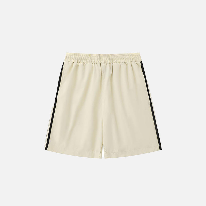 Back view of the beige Side Striped Sports Shorts in a gray background 