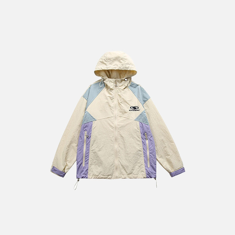 Front view of the khaki Patchwork Windbreaker Jacket in a gray background