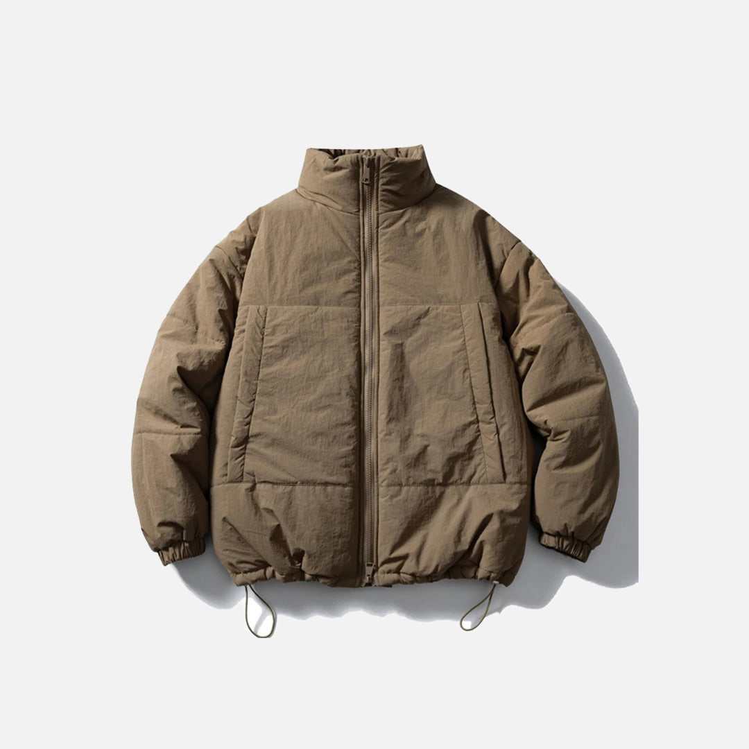 Front view of the khaki High-Neck Quilted Puffer Jacket in a gray background