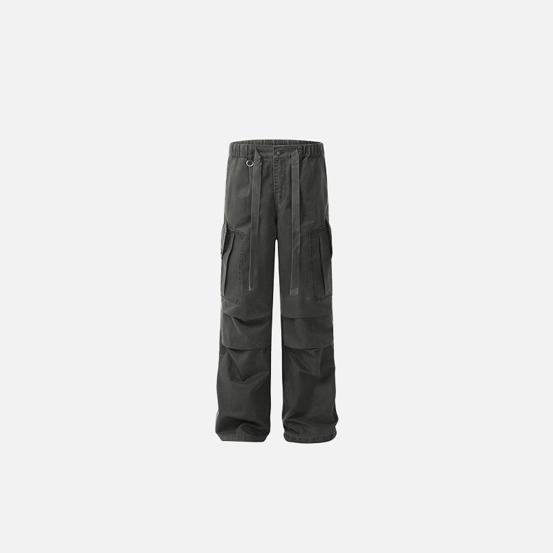 Front view of the grey Rugged Cargo Pants in a gray background