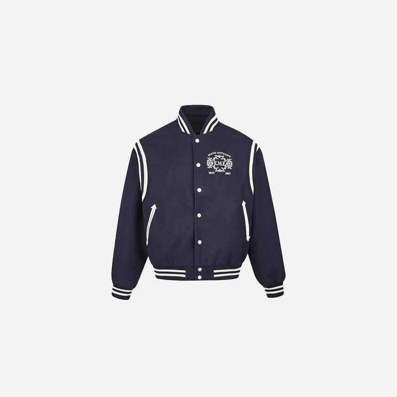 Front view of the blue Classic Varsity Jacket in a gray background