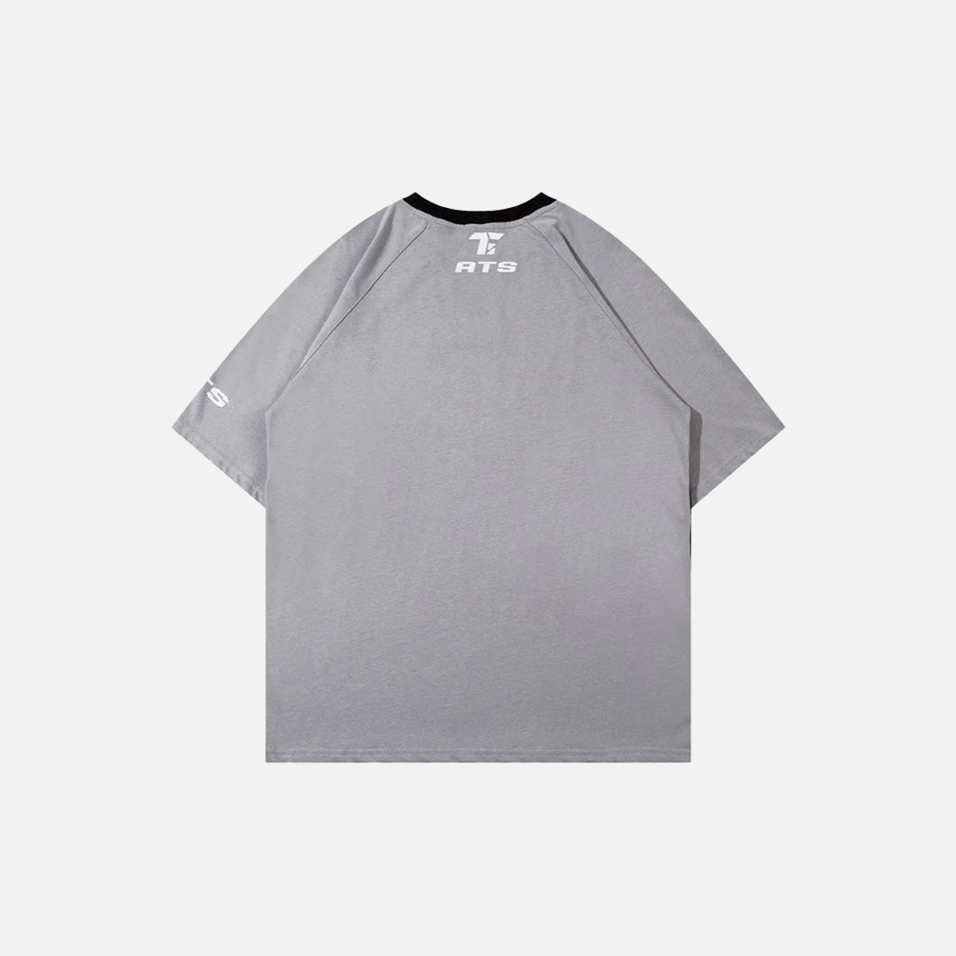 Back view of the gray Abstract Flow Raglan T-shirt in a gray background