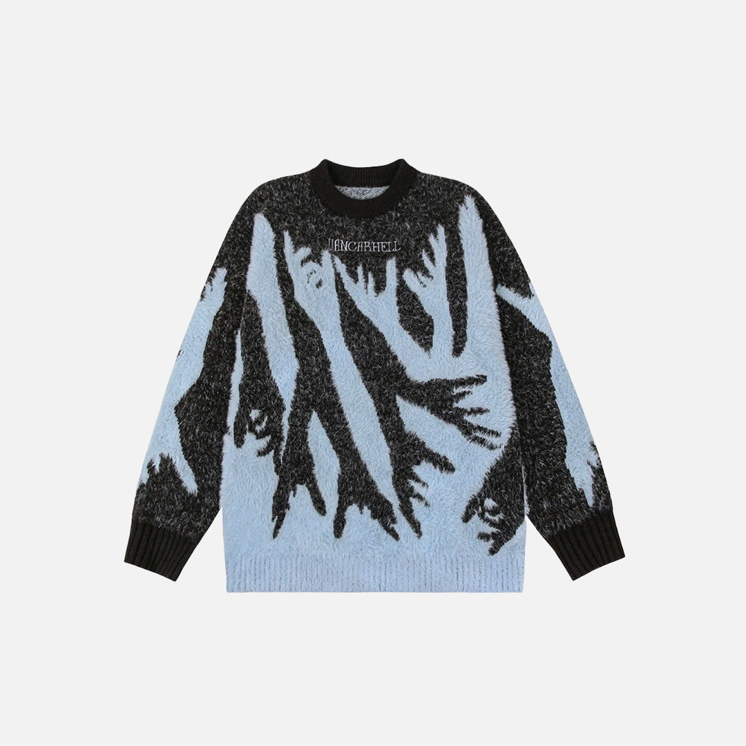 Front view of the blue Reach Of Shadows Sweater in a gray background