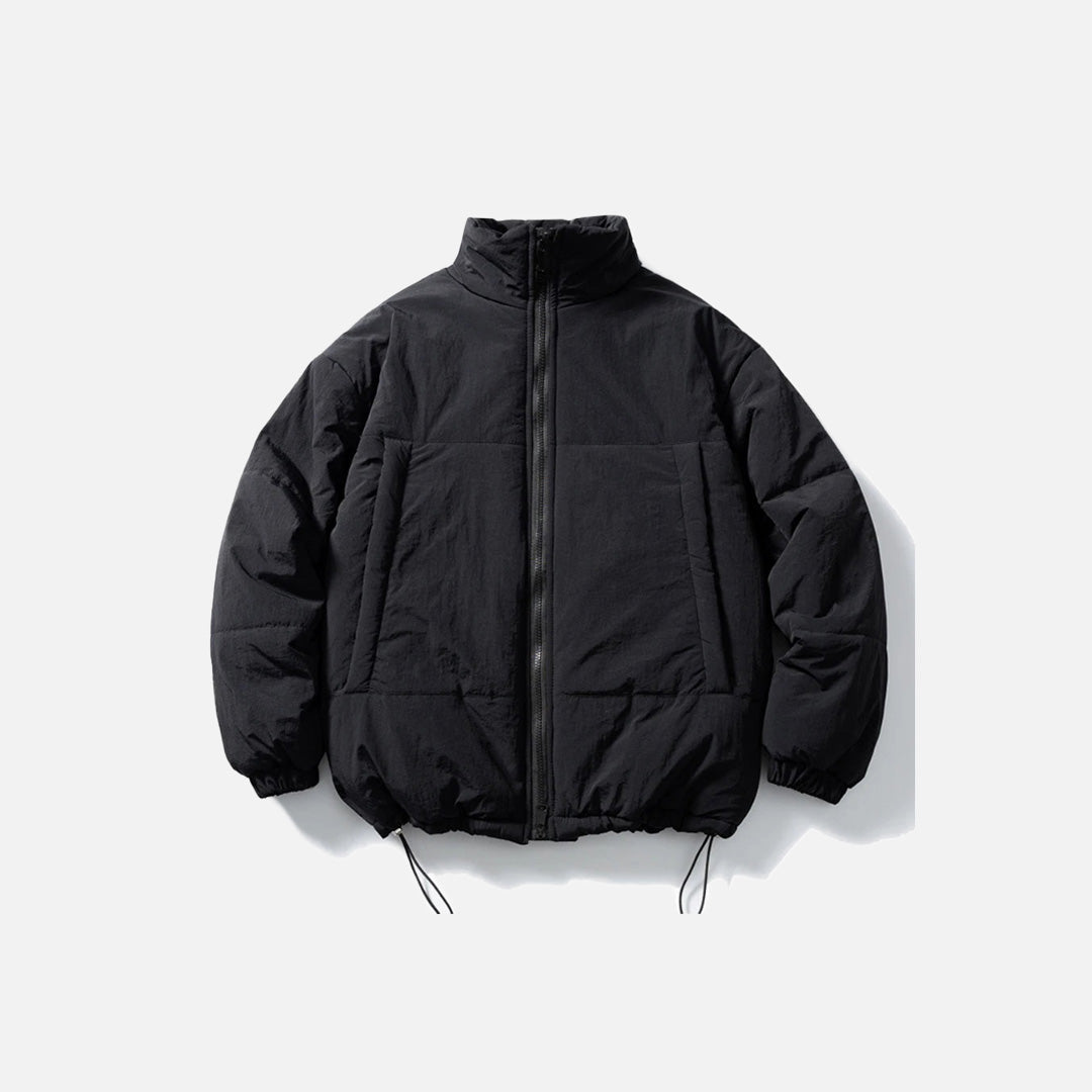 Front view of the black High-Neck Quilted Puffer Jacket in a gray background