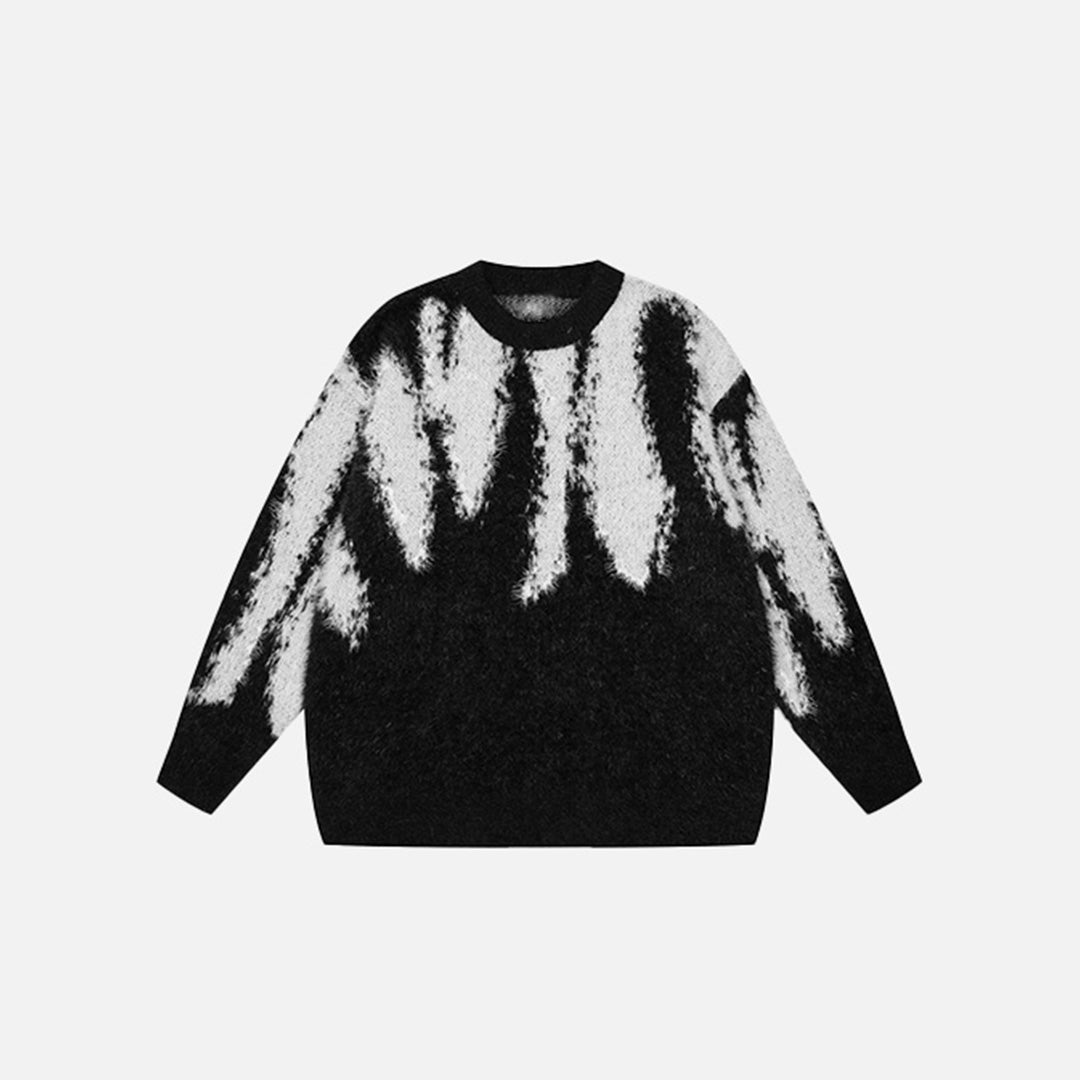 Front view of the black Tie Dye Knitted Sweater in a gray background