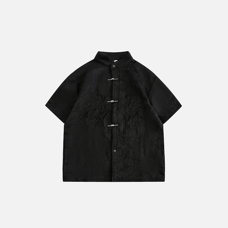 Front view of the black Classic Mandarin Embroidered Shirt in a gray background