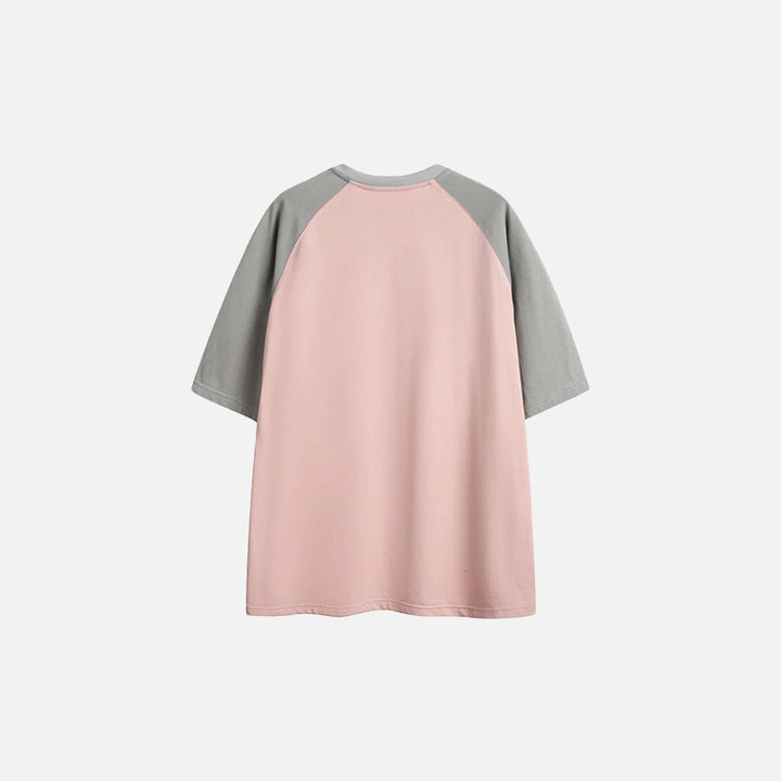 Back view of the pink Classic Raglan T-shirt in a gray background