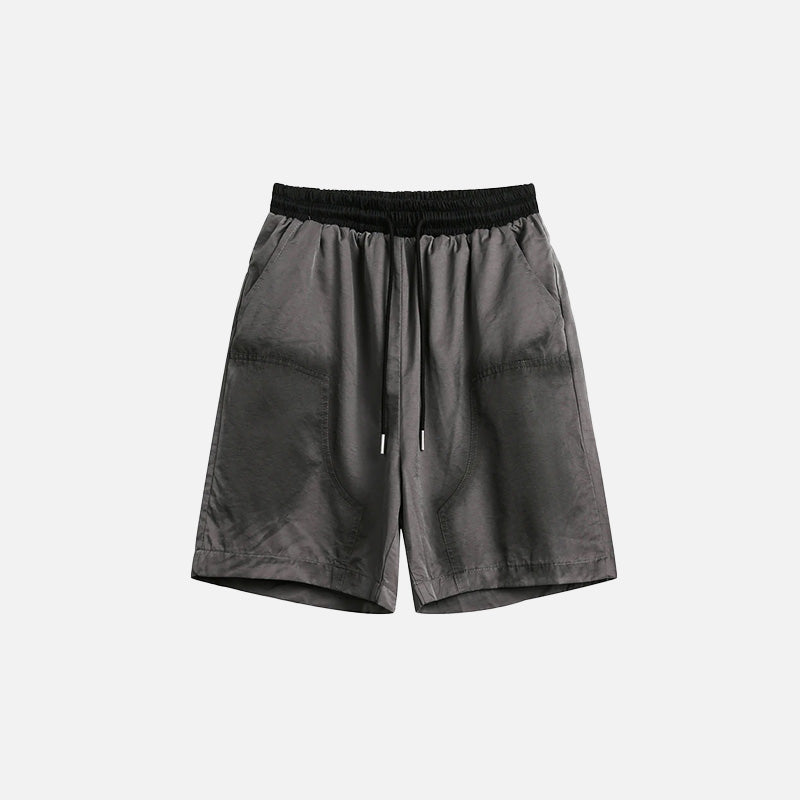 Front view of the gray Oversized Loose Cargo Shorts in a gray background