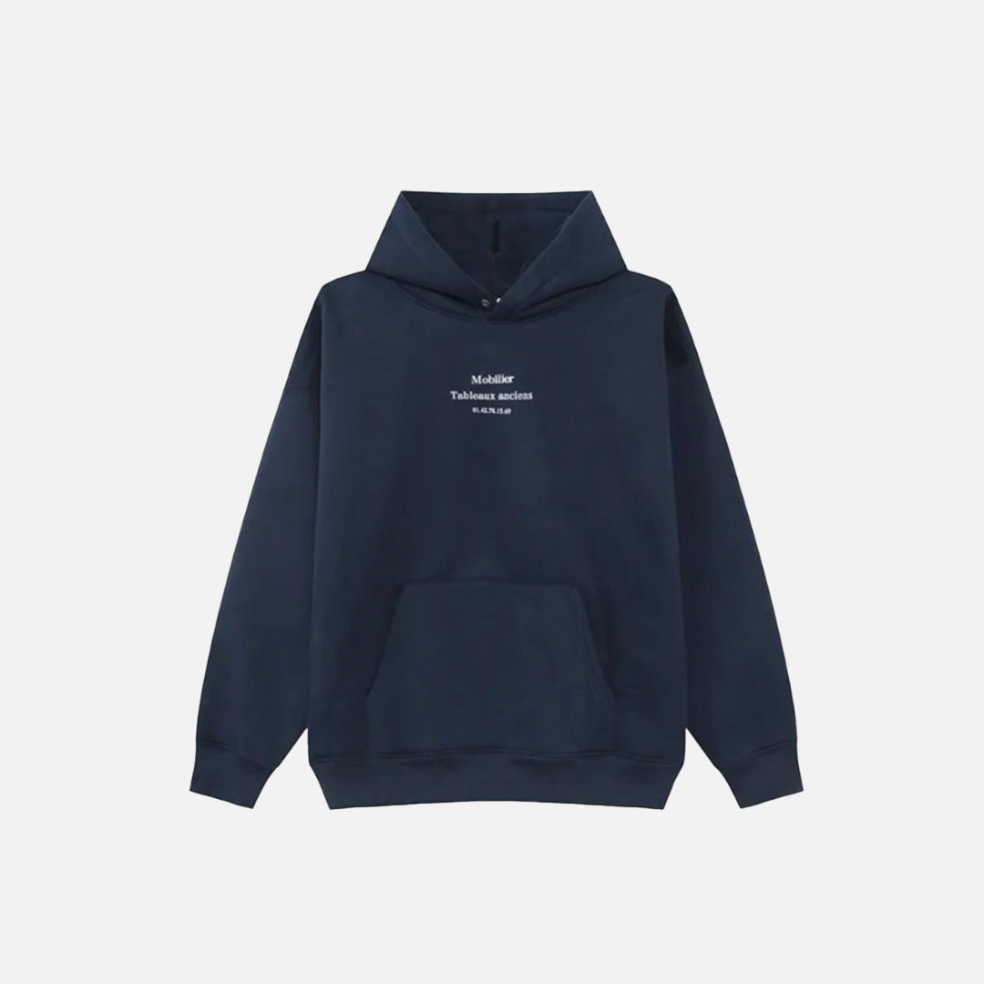 Front view of the navy blue Mobilier Tableaux Anciens Hoodie in a gray background