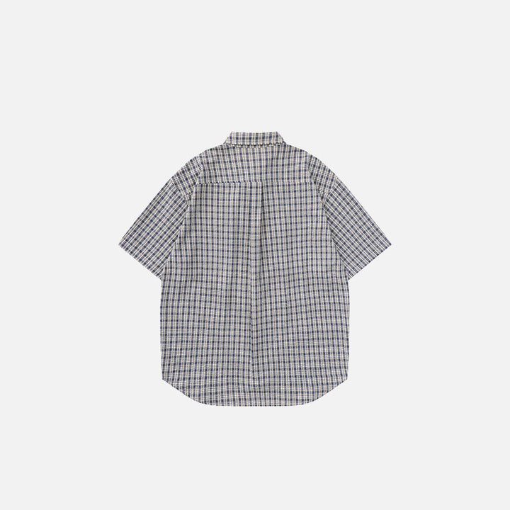 Back view of the black Plaid Reversible short Sleeve Shirt in a gray background