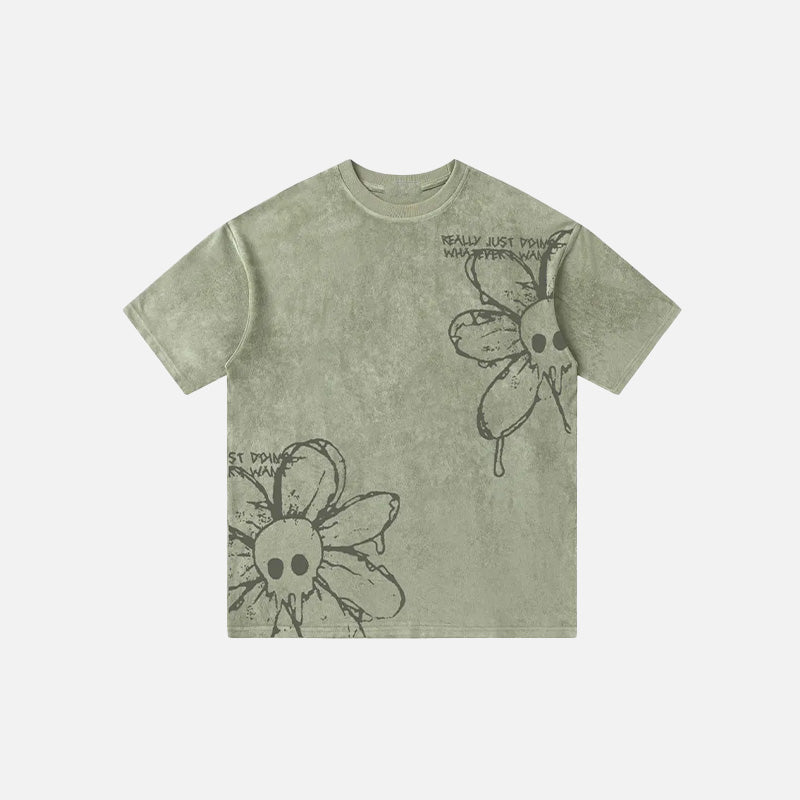 Front view of the green Washed Flower Floral Skull Graphic T-Shirt in a gray background 