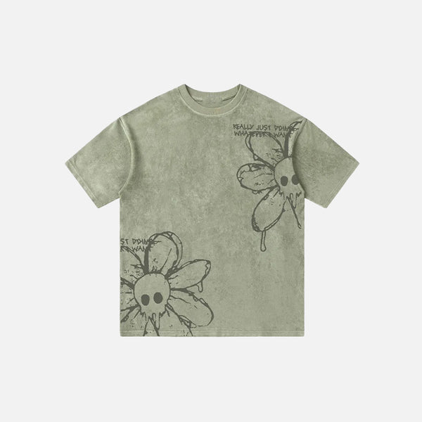 Front view of the green Washed Flower Floral Skull Graphic T-Shirt in a gray background 