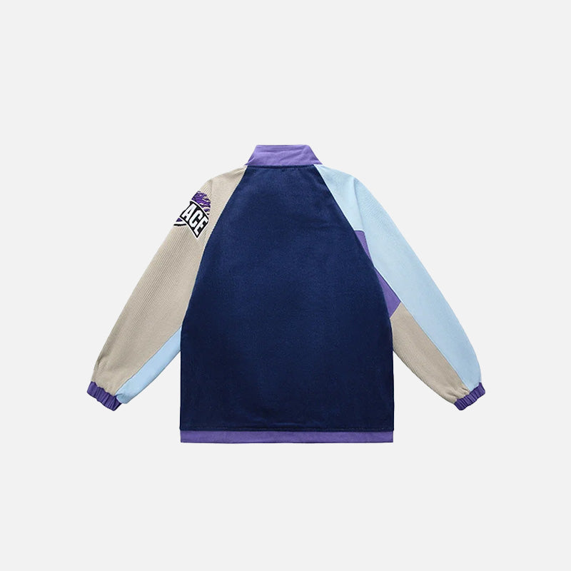 Back view of the blue Patchwork Varsity Racing Jacket in a gray background