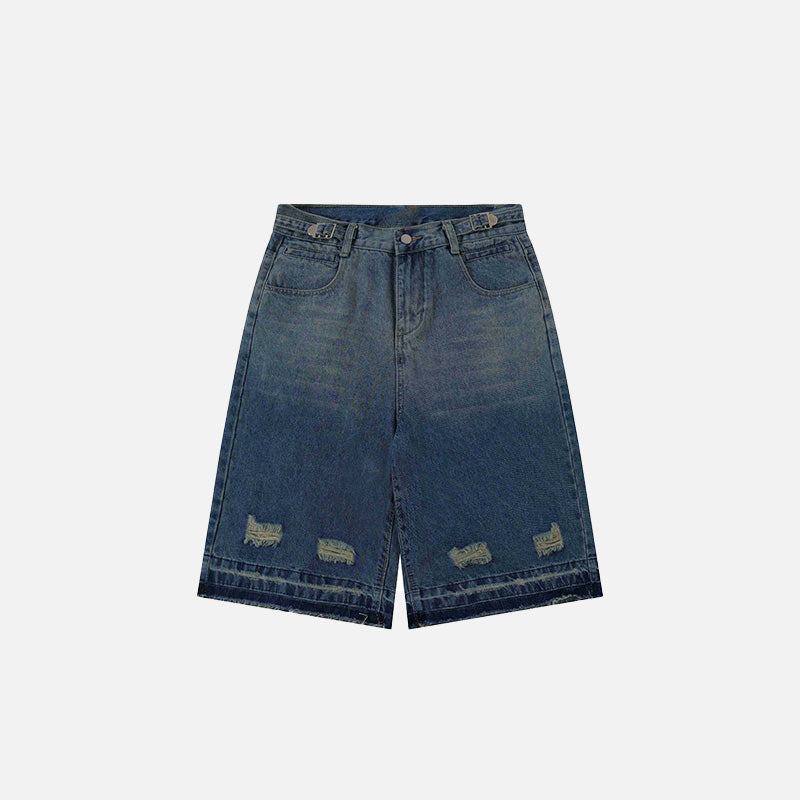 Front view of the blue Y2k Ripped Washed Jorts in a gray background