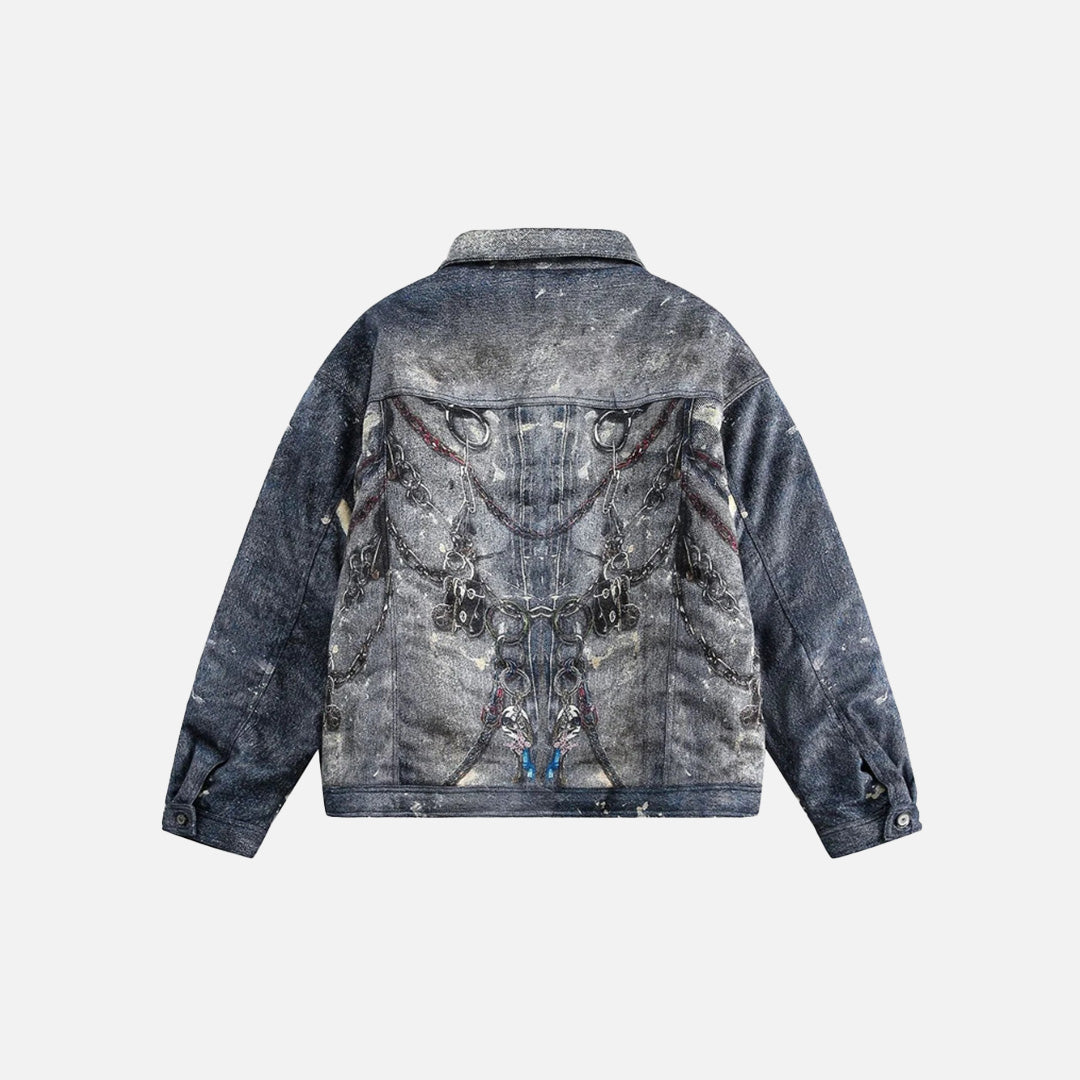 Back view of the blue Abstract Chain Detail Denim Jacket in a gray background