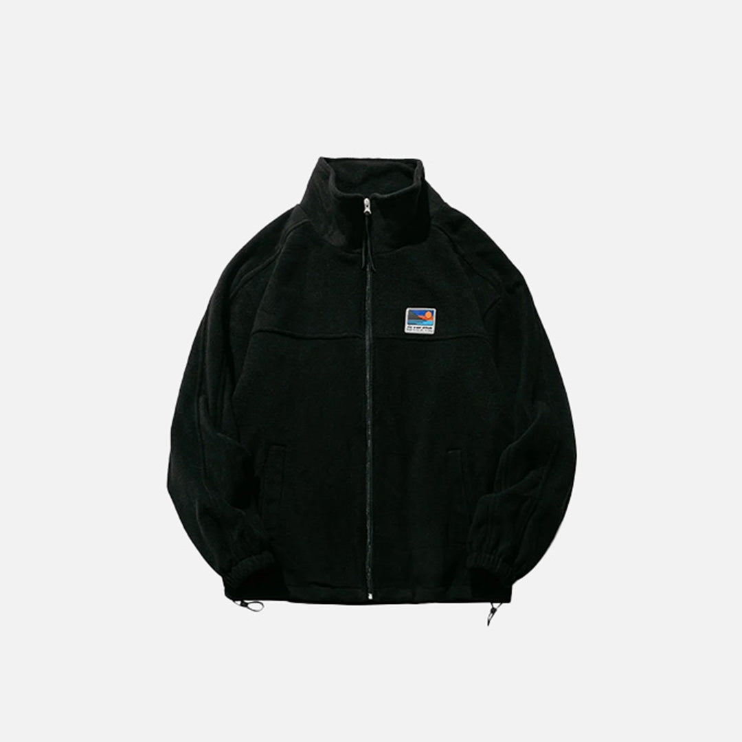 Front view of the black Adventure Seeker Jacket in a gray background