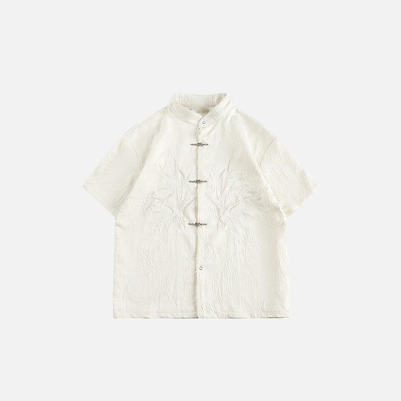 Front view of the beige Classic Mandarin Embroidered Shirt in a gray background