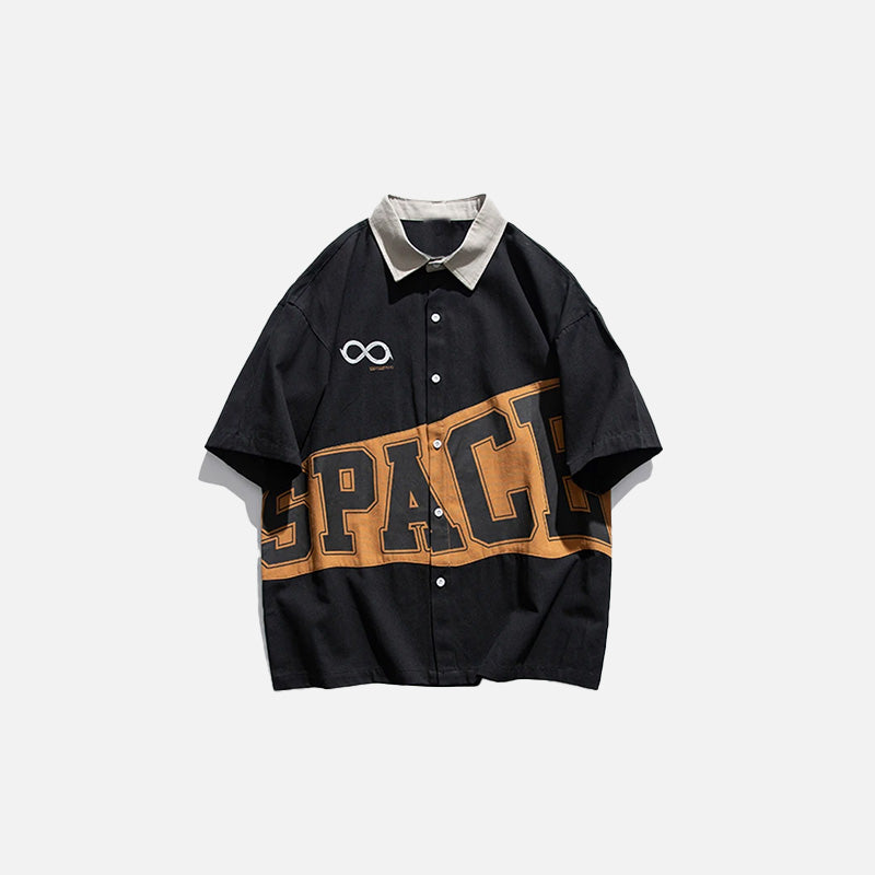 Front view of the black Space Patchwork Shirt in a gray background 