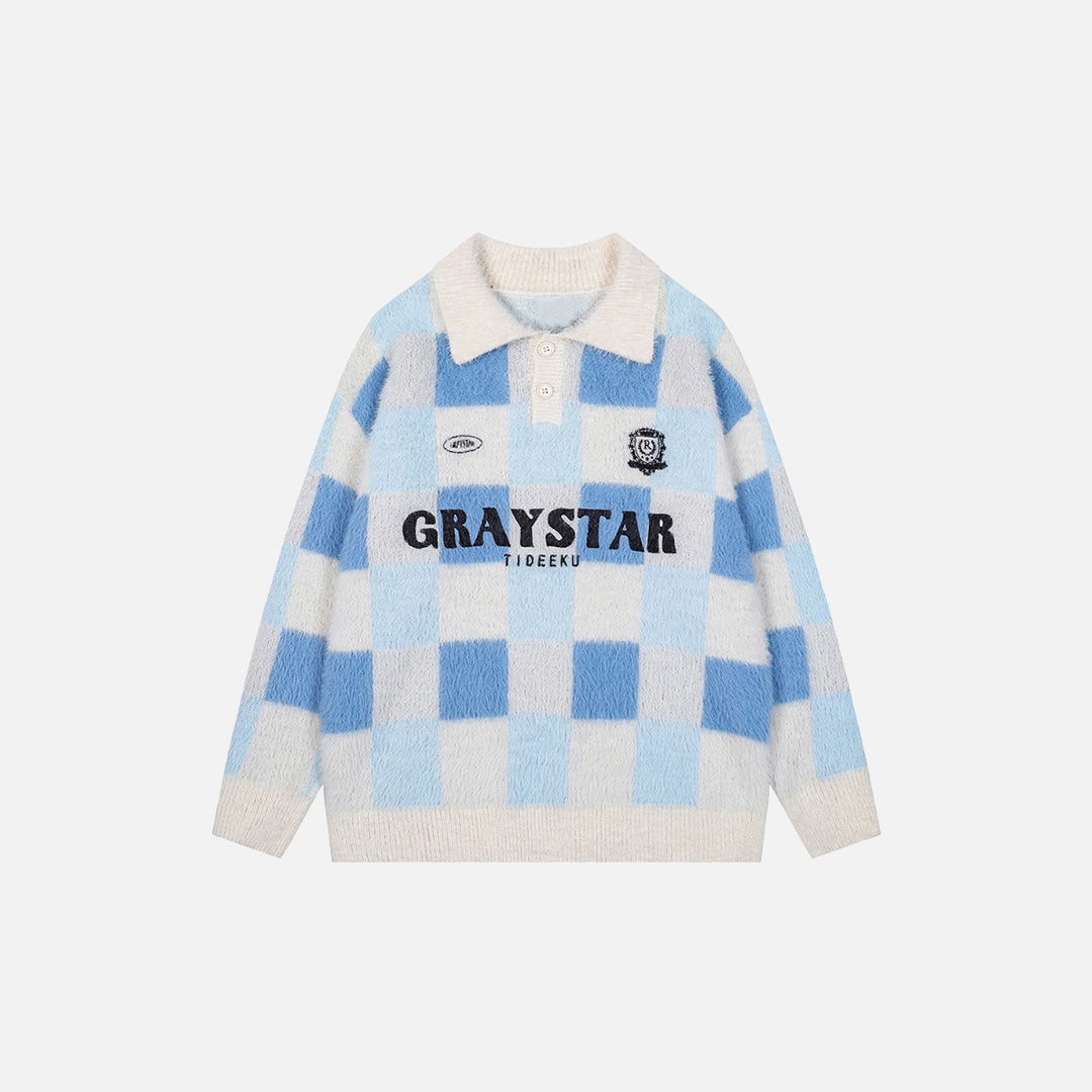 Front view of the blue Y2K Graystar Grid Sweater in a gray background