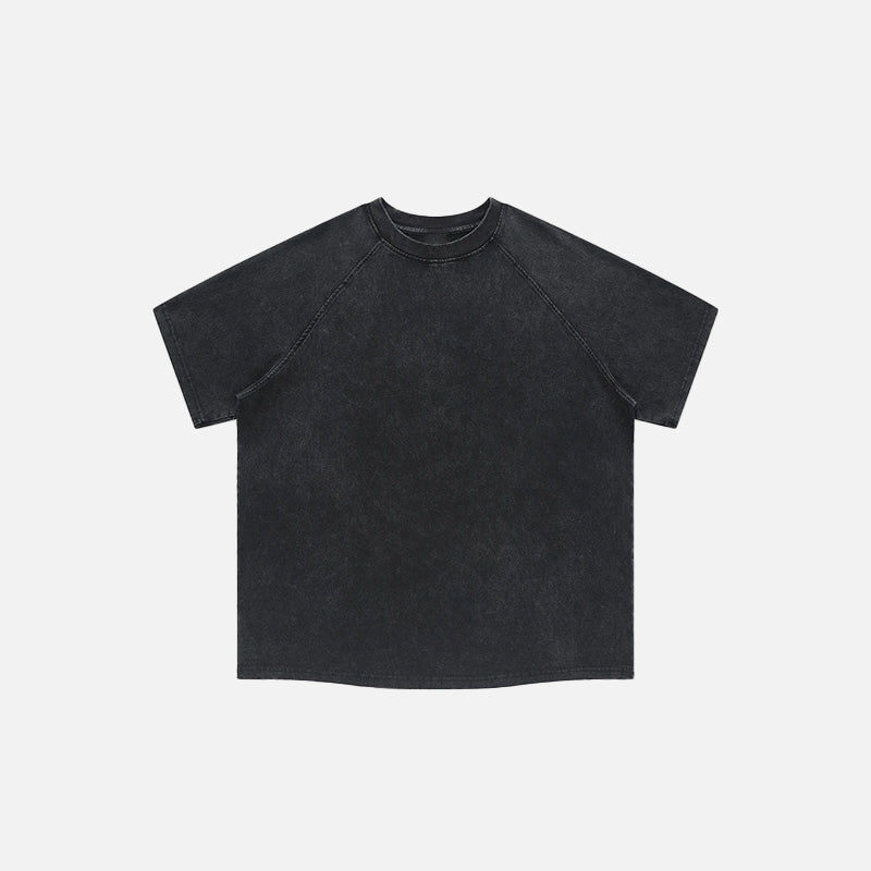 Front view of the washed black Loose Retro Washed T-shirt in a gray background