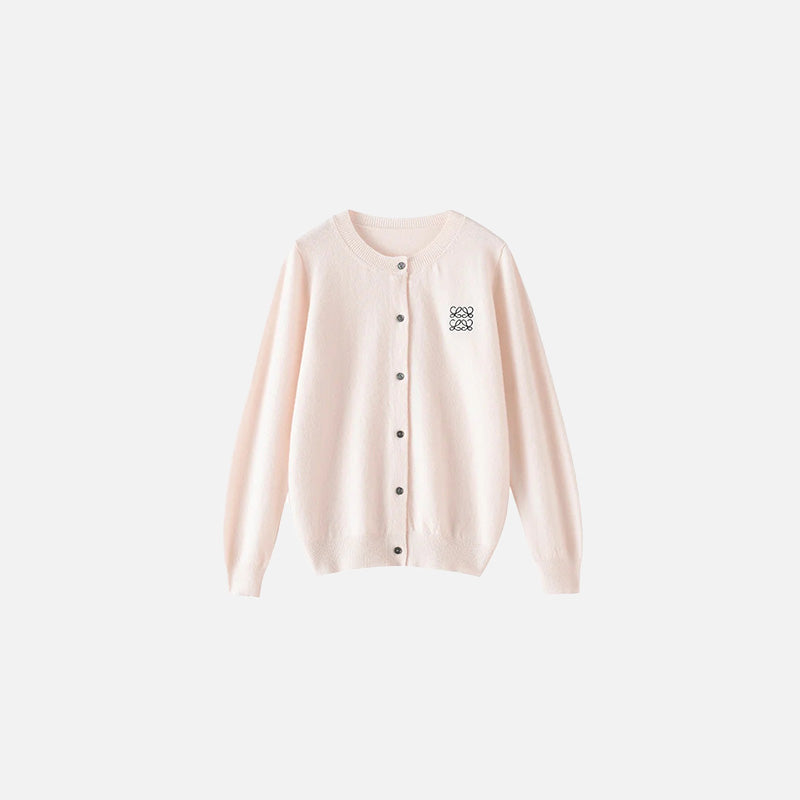 Front view of the beige Timeless Button-Up Sweater in a gray background