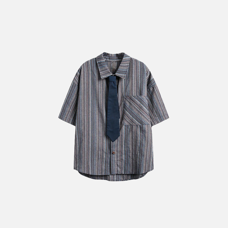 Front view of the navy blue Women's Oversized Striped Shirt in a gray background