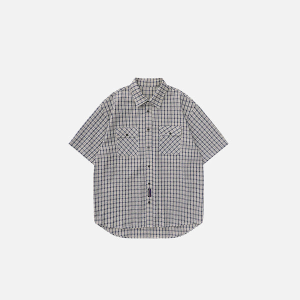Front view of the black Plaid Reversible short Sleeve Shirt in a gray background 