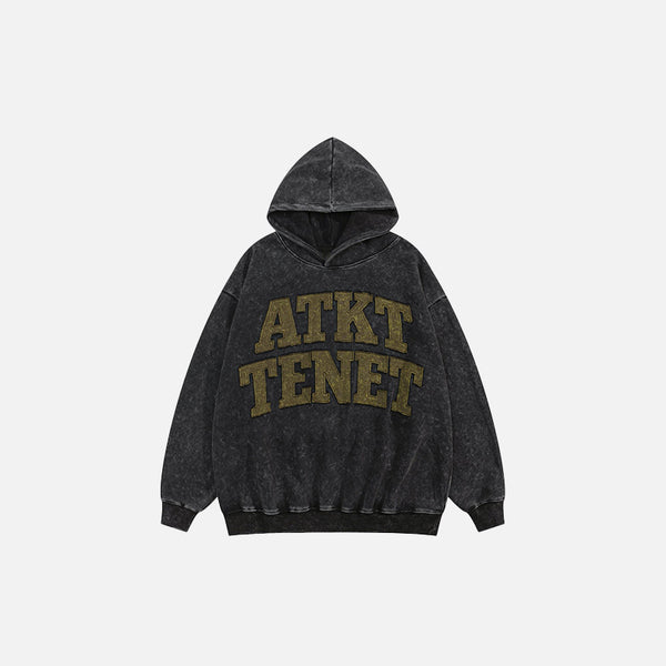 Front view of the black Loose Letter Prints Hoodie in a gray background 
