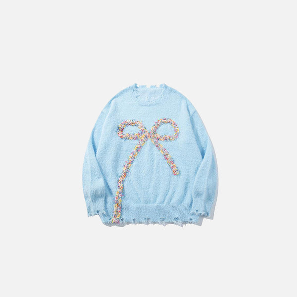 Front view of the blue Bow-Knot Embellished Sweater in a gray background