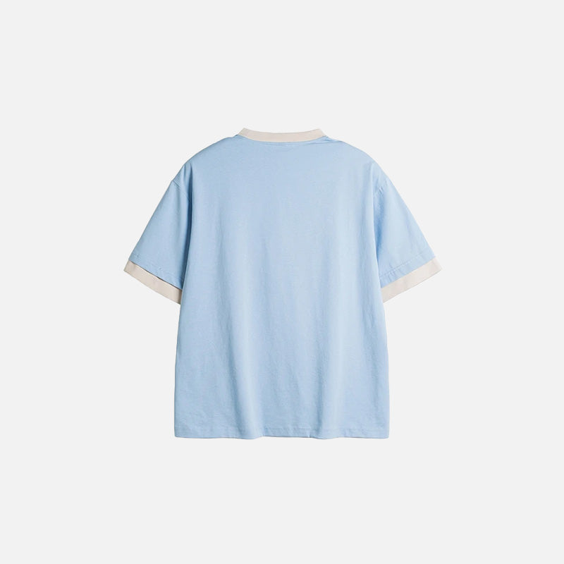 Back view of the blue Women's Loose Graphic T-shirt in a gray background