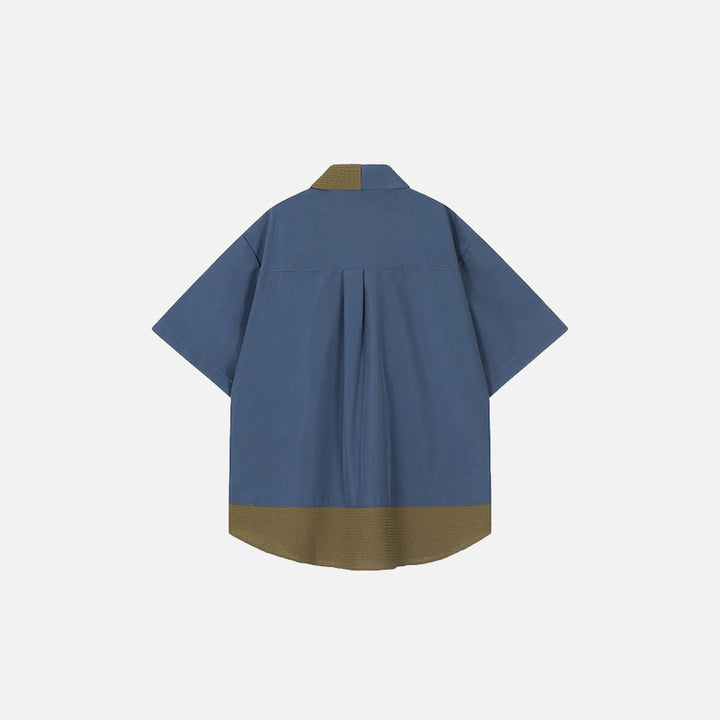 Back view of the blue Y2k Loose Patchwork Shirt in a gray background
