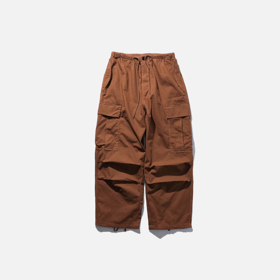 Front view of the brown Adventure-Ready Cargo Pants in a gray background 