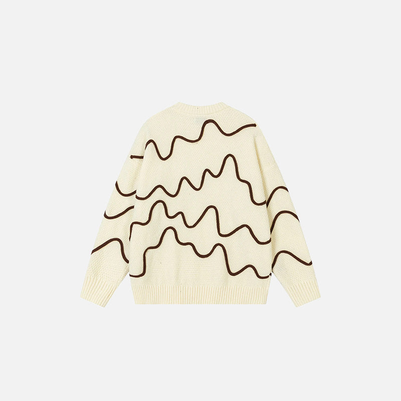 Back view of the beige Wave Pattern Sweater in a gray background 